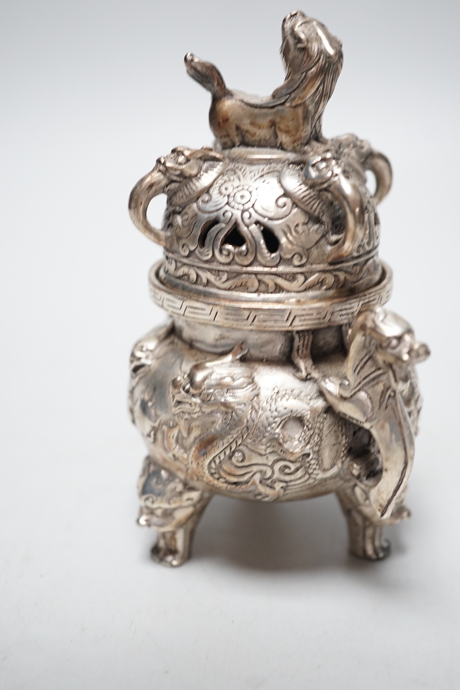 A Chinese cast metal censer and cover, seal mark to base. 13cm tall